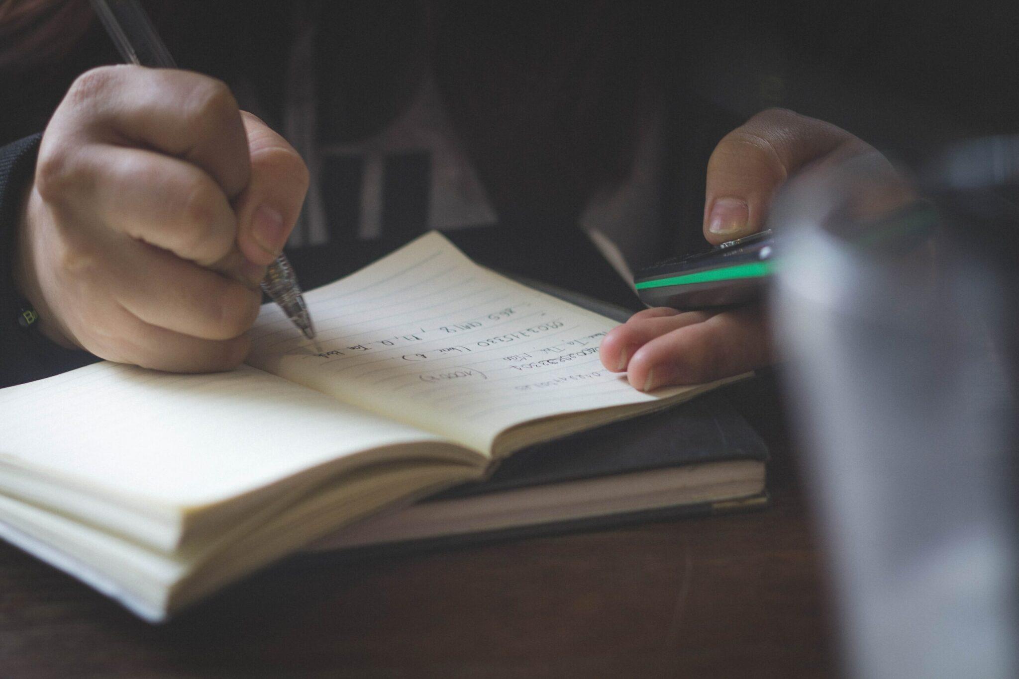 Handwritten notes in a journal